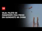Piloto de parapente fica preso em guindaste na China; veja imagens | CNN BRASIL