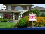 What is the "lock-in" effect as mortgage rates decrease