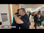 Heart attack survivor reunites with officers who helped save him