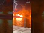 Three yachts engulfed by fires after explosion caught on camera