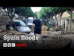 Spain's King Felipe 'devastated' by deadly floods as PM warns of dangerous conditions | BBC News