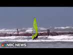 Windsurfers in Galveston enjoy Hurricane Beryl's waves - before being told to leave