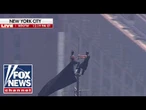BREAKING: Protesters CLIMB Empire State Building spire