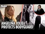 Shocking moment Angelina Jolie’s guard is collared by Ukrainian soldiers to be marched to frontline