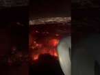 Shocking moment plane landing into LAX airport had a full view of the raging Palisades Fire