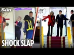 Bizarre moment Emmanuel Macron is SLAPPED by wife Brigitte while ‘bickering’ as they got off plane