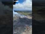 Lava appears near erupting Hawaiian volcano