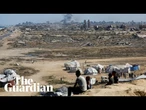Displaced Palestinians wary of Trump's Gaza plan as Israeli strikes continue