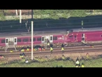 1 person killed, dozens injured after two trains collide north of London 