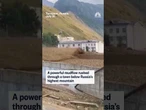 A powerful mudflow rushed through a town below Russia's highest mountain