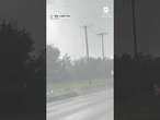 Power lines flare as tornado crosses Florida road