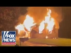 Teens returning from prom spot house fire, spring into action