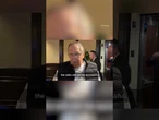 Russia's official arrives in Alaska wearing Soviet shirt before meeting Trump for peace talks