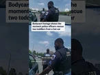 Bodycam footage shows the moment police officers rescue two toddlers from a hot car