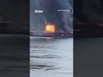 Moment helicopter explodes after crashing when it hit powerlines leaving two dead