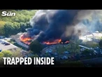 One dead and ‘hundreds trapped’ after suspect opens fire in Michigan church and building set ablaze