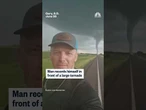 Man records himself in front of a large tornado in South Dakota