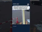 Car falls from rooftop parking into Japan supermarket