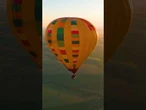 Cyclist becomes first person to ride on top of a hot air balloon