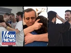 'MONUMENTAL DAY': Emotional reunions between hostages and families