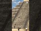 Tourist booed by onlookers while climbing sacred Mayan pyramid in Mexico