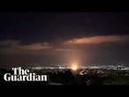 Moment apparent projectile hits Haifa in Israel on third night of conflict with Iran