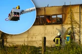 Lagerhalle brennt lichterloh: Behörden warnen Bevölkerung