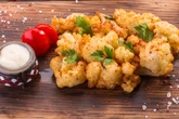 Vergiss Ofen & Pfanne: Rezept für Blumenkohl in der Heißluftfritteuse