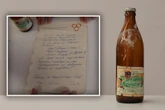 50 Jahre alte Bierflasche bei Bauarbeiten gefunden: Dann entdecken Arbeiter Zettel darin