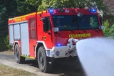 Feuerwehr findet schwerverletzte Person bei Waldbrand-Einsatz