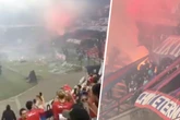 Spielabbruch! Fans legen Feuer auf der Tribüne und bewerfen Polizisten mit Eisenstangen