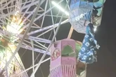 Riesenrad-Drama: Frau baumelt meterhoch in der Luft und kann sich kaum halten