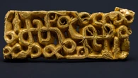 Hiker stumbles on 6th century gold sword scabbard under fallen tree