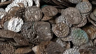 Fisherman searching for worms finds 20,000 medieval silver coins