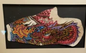 Father-son morticians turn tattoos into wall art