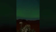 Aurora over Mars gives Red Planet a green glow