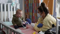 Baby gets bubble parade as she leaves hospital