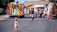 Toddler runs to firefighter dad in adorable moment