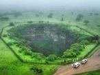 Mind the gap: tourists drawn to Oman's giant sinkholes