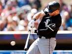 Rangers reacquire switch-hitting OF Robbie Grossman in a trade with the White Sox