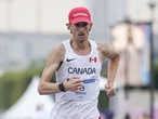 Evan Dunfee wins gold in 35K race walk at World Athletics Championships