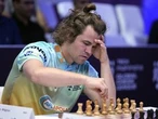 Chess grandmaster Magnus Carlsen is forced into a draw in a showdown against ‘the world’