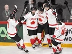 MacKinnon has three points, Canada finishes first in group with win over Sweden