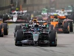 George Russell wins F1’s Singapore GP as McLaren secures constructors’ title