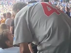 Fan slapped for remaining seated during anthem in viral video, sparking debate
