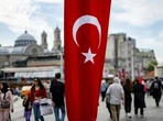 Tourist in hot water for pole dance on Turkish flagpole
