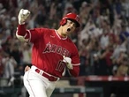 Shohei Ohtani met Los Angeles manager Dave Roberts at Dodger Stadium