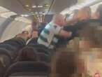 Unruly passenger punches airline crew, cops in scene caught on video