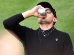 Mackenzie Hughes chugs beer on first tee at Presidents Cup