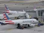 American Airlines passengers subdue man who tried to open emergency exit midflight